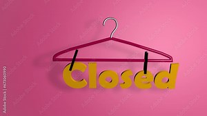 Closed, hanging on a hanger. Shop sign announcing closure. The boutique is closed.