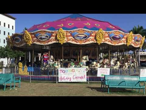 Carousel at the 100-Foot Christmas Tree in Delray Beach, FL, USA