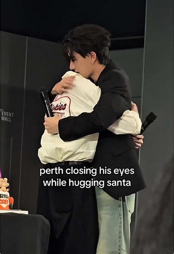 Heartwarming Moments of Perth Hugging Santa