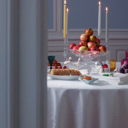 Georg Jensen Damask's Christmas tablecloth with two-dimensional fir branches and intertwined hearts has become a staple of the Danish Christmas table. https://www.georgjensen-damask.com/products/christmas-tablecloth-round-christmas-tablecloth-white/ | Georg Jensen Damask