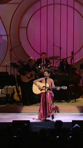 In 2006, Shania Twain honored Dolly Parton with a heartfelt performance of 𝘊𝘰𝘢𝘵 𝘰𝘧 𝘔𝘢𝘯𝘺 𝘊𝘰𝘭𝘰𝘳𝘴 at the Kennedy Center Honors—an iconic moment for an American icon. Now, the celebration continues. 🎻 June 26–27, 𝘛𝘩𝘳𝘦𝘢𝘥𝘴: 𝘔𝘺 𝘚𝘰𝘯𝘨𝘴 𝘪𝘯 𝘚𝘺𝘮𝘱𝘩𝘰𝘯𝘺 brings Dolly’s beloved songs to life in an orchestral experience powered by the National Symphony Orchestra. A night of strings and soul, elevated by their unmatched artistry. Reserve your seats now at tkc.co/DollyParton
