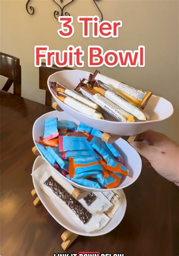 Your kitchen just got an upgrade. This 3-tier fruit bowl is giving clean, modern, and organized vibes. Stack your fruits, snacks, bread, or treats in a beautiful tiered display that saves space and looks amazing on any counter. Bamboo stand curved bowls = instant aesthetic. Why everyone wants it: • 3-tier vertical design saves space • Strong bamboo stand for stability • Great for fruit, snacks, bread, candy & more • Easy to style in any kitchen or dining space • Turns clutter into decor Function