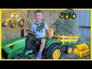 Tractor toys for kids on the farm | Playing with riding tractor in the dirt and hay