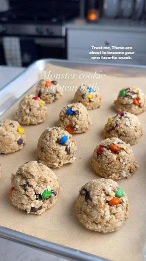 MONSTER COOKIE PROTEIN BALLS 🍪deliciously addictive and so easy. The perfect pre-workout boost, afternoon pick-me-up, or sweet treat after a meal! Ingredients: 1 cup quick oats (80 g) 2 scoops vanilla protein powder (64 g) pinch salt 1/4 cup peanut butter (64 g) 3 tbsp honey (63 g) 2-3 tbsp unsweetened almond milk (30 ml) 2 tbsp mini semi sweet chocolate chips (30 g) 2 tbsp mini m&ms (26 g) Instructions: 1. In a bowl or container, whisk together the oats, protein powder and salt. 2. Add the pea