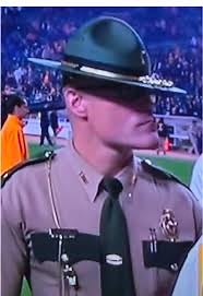 Who is this cop that never turns his body cam on? They call him the Unknown Sergeant, a.k.a. Cassius Thunderc****, a Tennessee state trooper who went viral after being spotted at a college football game and is now a meme icon. | Know Your Meme