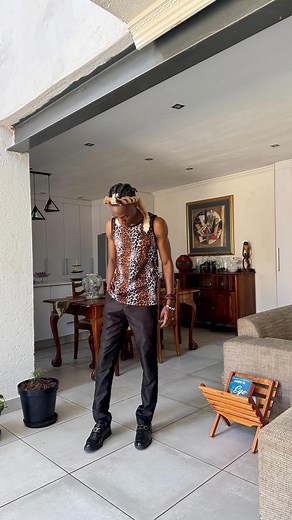 P̶a̶u̶l̶ ̶B̶l̶a̶z̶e̶ on Instagram: "Embracing the essence of urban Zulu style with a modern twist. Combining a classic Zulu shirt with sleek black pants and loafers, topped off with an umqhele headband and earthy bead accessories. Celebrating tradition while making it my own. ✨ #urbanafrican #zulustyle #moderntradition #fashionfusion #culturalheritage #ootd #styleinspo"