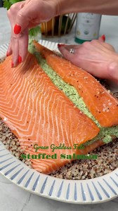 Save my GREEN GODDESS FETA STUFFED SALMON (recipe below) for the next time you are entertaining! It is the perfect dinner party dish because it’s so incredibly easy to make, and it can be prepped the night before! Serves 6 Green Goddess Feta Ingredients: 2 garlic cloves peeled 1½ cups of spinach ½ cup of basil ¼ cup tarragon or mint ½ cup parsley Juice of 1 lemon 4 ounces of feta ½ tsp salt ¼ cup olive oil ¾ cup of peas, thawed 4 scallions sliced thin Salmon Ingredients: 3 lb salmon tail filet, 
