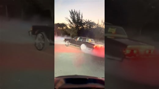 Box Chevy on 26’s covering the whole street in smoke