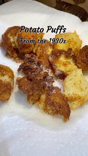 Potato puffs from the 1930s. Mixed together one cup, leftover mashed potatoes, two eggs, and 1/4 teaspoon baking powder. Drop by spoonful into hot grease or lard. Fry until browned, turn over, and brown other side. #Vintage #PotatoPuffs #PastTimeCook #VintageRecipes #1930s. | PastTimecook