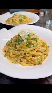 Seafoods Pasta in Creamy Sauce ❤️😋 Ingredients: 250g Pasta Linguine Salt and Pepper 2 packs mix seafoods(frozen) 2 tablespoon olive oil 1 onion, minced 1 teaspoon aglio olio mix herbs (italian herbs) 150ml white wine 200g or 1 cup heavy whipped cream or Schlagsahne 1/2 cup pesto Rosso or handful tomato cherry (alternative) Spring onion, minced or parsley 2 tablespoon cream cheese or crème frách 2 tablespoon Parmesan cheese #pastafruttidimare #seafoodspasta #creamypasta #dinnerideas #cooking #my