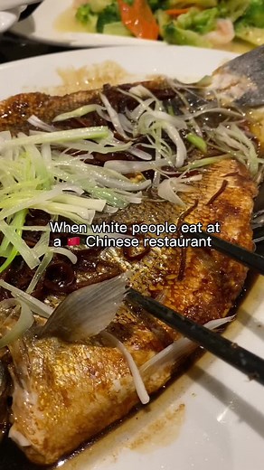 He's eating the steamed fish like fish and chips 😳 #chinese #asian #asianfood # china #chinesefoodlover #oldjinli #oldjinlilondon