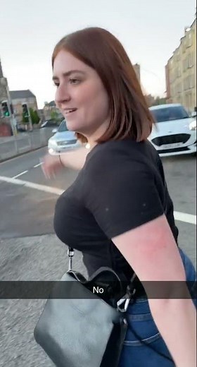 Woman Rips Her Pants While Dancing in Middle of Street - 1205588