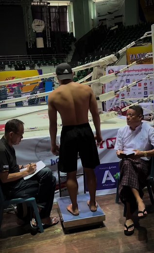 Boxing Weigh-In: Muscular Male in Action