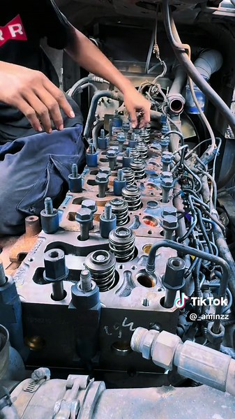 Engine Maintenance Techniques in a Mechanical Workspace