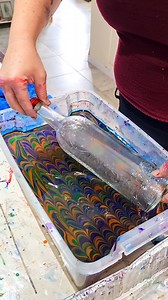906K views · 49K reactions | Recycling glass bottles via Water Marbling gives them a new look . Perfect for a plant cutting or fairy lights ✨️ | Raynbow Crow Studios | Facebook