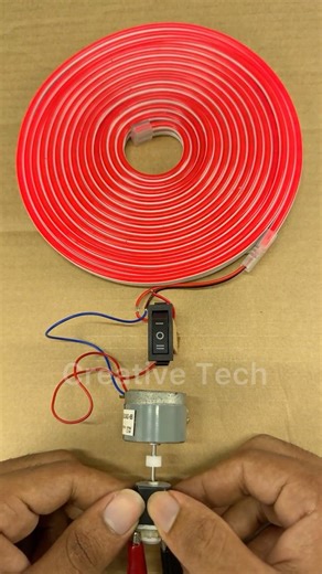 Motor powering into a Neon strip Light using Dc motor #dcmotor #tech #shorts