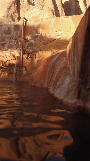 Step into waters painted by nature’s hand. The Iron Pool doesn’t just nourish your body — it paints the stones with its own mineral story. That warm, reddish tint on the rocks? It’s the work of naturally occurring iron oxidizing as it meets the open air. And that rough texture on the corner stone of the pool? Minerals left over time taking on a shape of their own, a natural sculpture from the Earth herself. A quiet reminder that even minerals leave footprints — and sometimes, healing isn’t spotl
