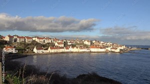 Pittenweem, a charming fishing village in the East Neuk of Fife on the East coast of Scotland. Filmed from an elevated position.