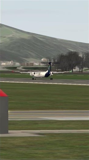 DH8D Olympick Air landing at INN