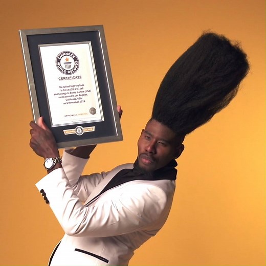 Model Benny Harlem's incredible hairstyle has gained him a hi-top spot in the new #GWR2018 book > www.bit.ly/GWR-HiTop | Guinness World Records