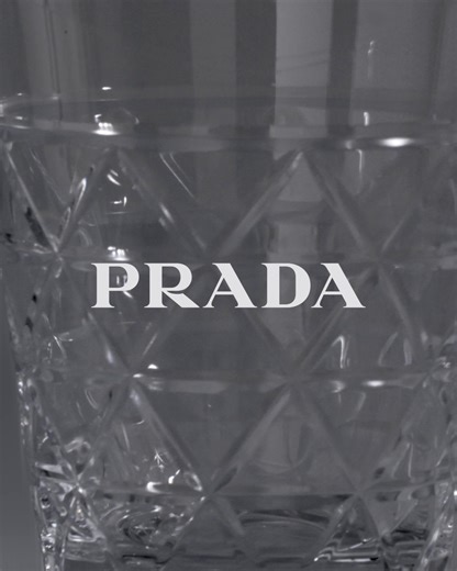 The Prada Home Collection features glassware in minimalistic plinth silhouettes, made from hand-blown Bohemian crystal, in a range of natural tones. Discover more on prada.com | Prada