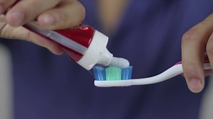 Download Toothpaste Dropping A Toothbrush for free