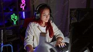 Defiant young redhead streamer gal, crossed arms stance, gaming room antics, late night cyber game streaming session