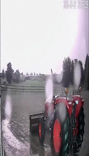 Lightning Strikes Tractor in Freak Storm — Security Camera Captures the Unbelievable Moment Engine Starts Itself By Country Chronicle Staff A small farming community outside of Springfield witnessed an extraordinary moment during last night’s thunderstorm when a lightning strike hit an old tractor — and miraculously started its engine. The bizarre incident was captured by a grainy security camera overlooking the property, showing a quiet field as rain pours down. Moments later, the screen flashe