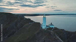 Sunset over Start Point Lighthouse from a drone, Trinity House and South West Coast Path, Devon, England