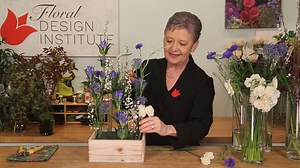 4.7K views · 108 reactions | Bring the garden inside to enjoy by creating a vegetative-style landscape design that really showcases each flower's unique stem and bloom. Th is a style that can really let your flowers reach tall in a design. In this Flower School How-To Video Leanne works with a cheerful assortment of blue and white flowers, including gentian, bachelor buttons, veronica, narcissus, and more. It's Spring in a box - enjoy! | Floral Design Institute | Facebook