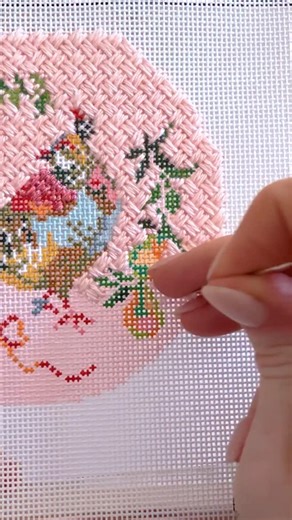 Woven Trellis is my new favorite decorative stitch! It creates a beautiful, basket-woven or lattice effect - perfect for areas on your needlepoint canvas where you want to add a textured, soft, and fabric-like feel. I love using it on backgrounds, clothing details, and anything that would look nice with a woven texture. Try this on your next project, it’s a fun one! This canvas is from my collection with @inslee and I’m having so much fun stitching it 🪡 💕 | Coco Frank Studio