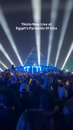 Cairo Spots on Instagram: "The moment has arrived. Tiësto is now live at the Pyramids of Giza, turning the Giza Plateau into a full scale electronic music arena. The crowd is deep, the lights are cutting through the night, and the energy has fully shifted as the main set unfolds in front of one of the most powerful landmarks in the world. A night where history and modern sound collide, happening right now in Cairo. Follow Cairo Spots, visit our website cairospots.com and download our Cairo Spots