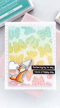 Create a rainbow butterfly background with Lawn Fawn products! #cardmaking #scrapbookandcardstoday