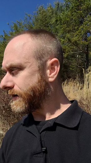 Person in Outdoor Setting with Nature Background