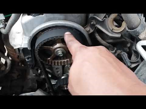 How to install the timing belt and tensioner on a Honda Civic 1.7 16v 2001 2002 2003 2004 2005