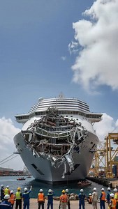 14K views · 30 reactions | Damaged cruise ship returns to port after ocean collision! The front of this luxury liner looks like it went through a warzone — and in a way, it did. After colliding with another cruise ship at sea, the vessel finally made it back to port. Crowds gathered, shocked at the sight — luckily, everyone onboard is safe. #wow #ai #fail #really #crash #ship #port #collision #travel #oceanaccident #shock #boat #liner #cruise | The.worldai | Facebook