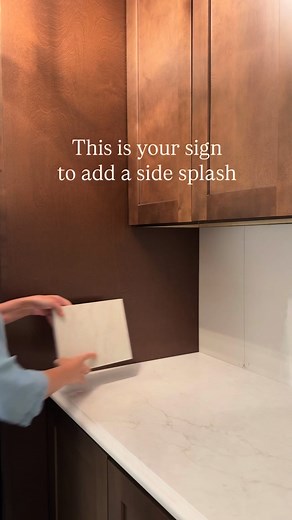 Sidesplashes never went out of style, they just got an upgrade from the 4” block 🤌🏻 send this post to yourself for inspiration on your next kitchen or bath remodel. The counters: sereno gold quartz from @vadaraquartz | The Lived-in Look