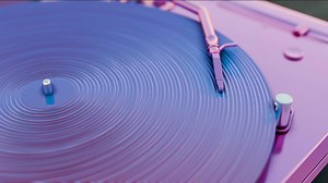 a purple turntable with a purple record on it