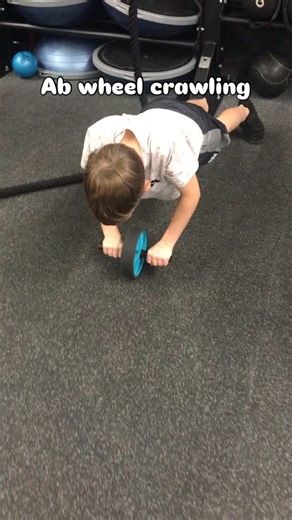 Give this a try! He just came up with this on his own. #kidsworkout #kidsexercise #fitkid #abchallenge #strongcore #abs #core #abwheel #abwheelchallenge | Brian Elliott
