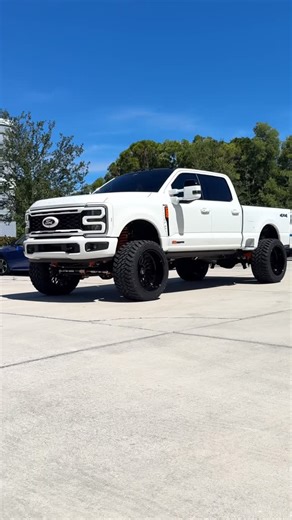 Extreme Performance on Instagram: "Rolling into the evening with this 2025 Ford F-250 Powerstroke going with the 5” BDS Suspension system with Fox shocks that was all painted in a custom orange by the Extreme Paint Shop before being installed! Sitting on a set of 24x14 KG1 Forged Seismic wheels wrapped in 375-60 Nitto Trail Grappler tires! The Extreme Paint Shop then taking over color matching and adding orange accents throughout the exterior of this truck while also custom painting the headligh