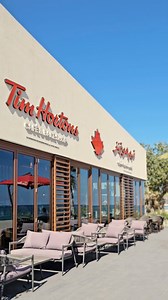 Tim Hortons Middle East | Beach vibes meet Tim Hortons magic! 🌊 Step into the most unique Tim Hortons store at Khorfakkan Beach! 🏝️ With interiors inspired by... | Instagram