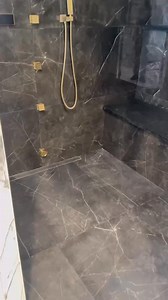 1K views · 32 reactions | ✨ Discover this stunning 6x6 large format porcelain tile shower! It features a cutting-edge steam system and a digital shower setup with three body jets, a rainfall showerhead, standard showerhead, and a hand sprayer. Plus, enjoy a full bench and a sleek infinity niche on the back wall. Elevate your shower experience!  #BathroomGoals #ShowerInspo #HomeDesign | Seth Riley | Facebook