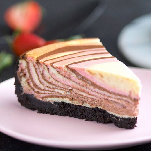 3.8M views · 10K reactions | 3 classic flavors, one gorgeous cheesecake - we're hypnotized. Full Recipe: taste.md/2IpVnuy | Tastemade | Facebook