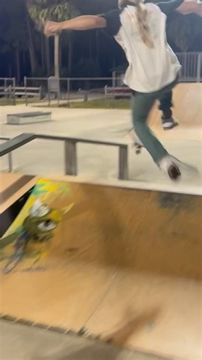 Tre-flip over the mini spine