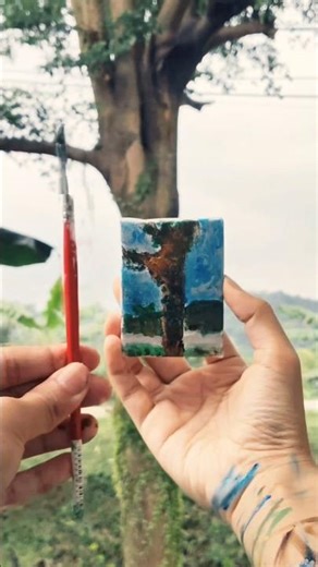 painting a tree in front of a tree timelapse