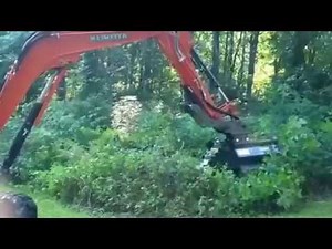 Kubota KX057 demo with RockHound Flail Mower Attachment