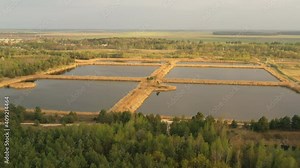 4K Cinematic Calm Flight Above Aerial View Retention Basins, Wet Pond, Detention Basin Or Stormwater Management Pond
