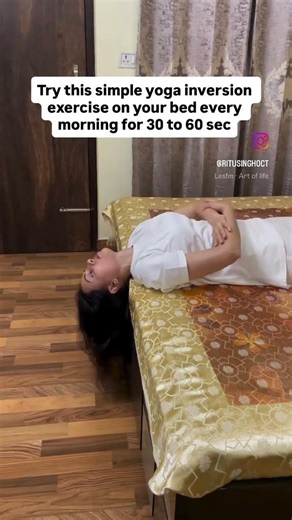 Try this simple yoga inversion exercise on your bed every day. #glowingskin #facialyoga #yoga