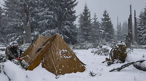 2.4M views · 26K reactions | Caught in a snow storm winter solo overnighter in hot tent. | Beautiful Cabin | Facebook