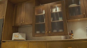 Effortless kitchen: Motorised cupboards descend to counter level